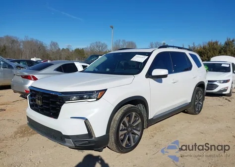 2023 Honda Pilot 2Wd Touring z USA, uszkodzony, nr VIN 5FNYG2H71PB003593